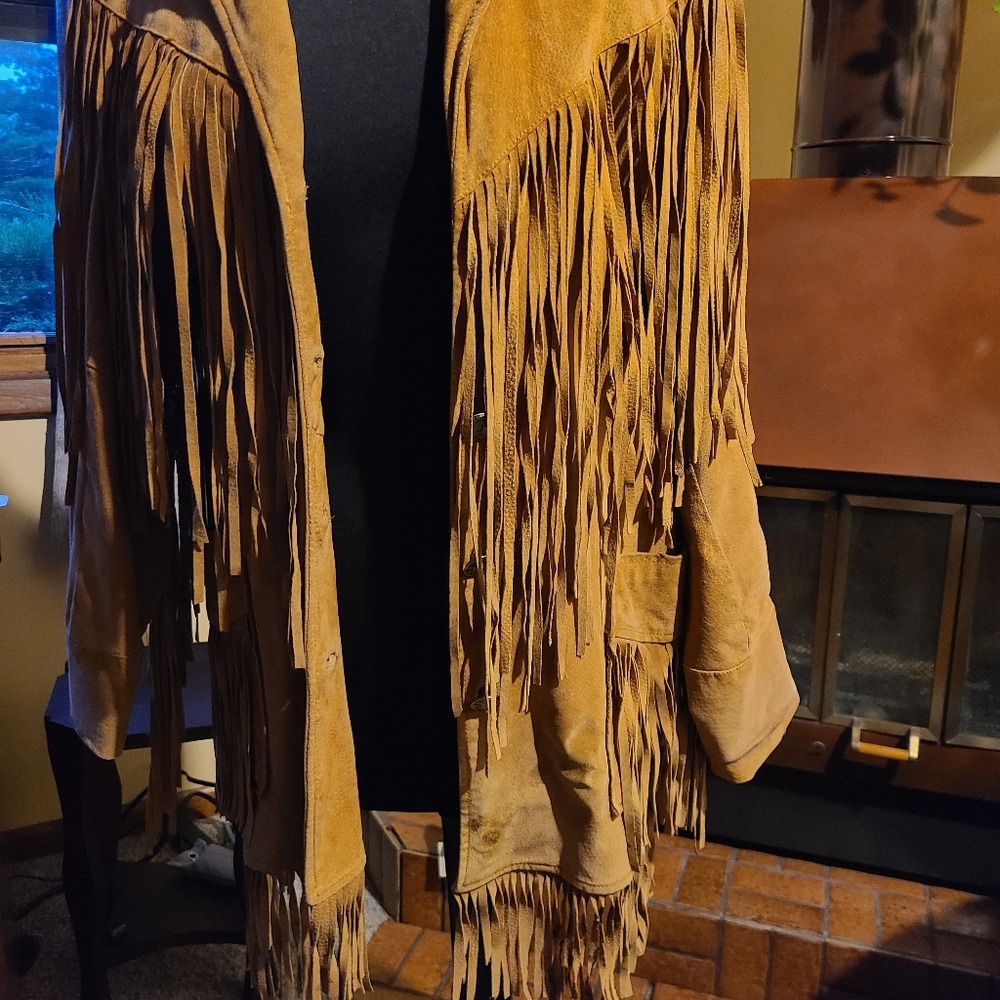 Cedars vintage leather with fringe Medium in size.